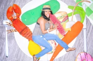 Woman posing in a vertical photo booth
